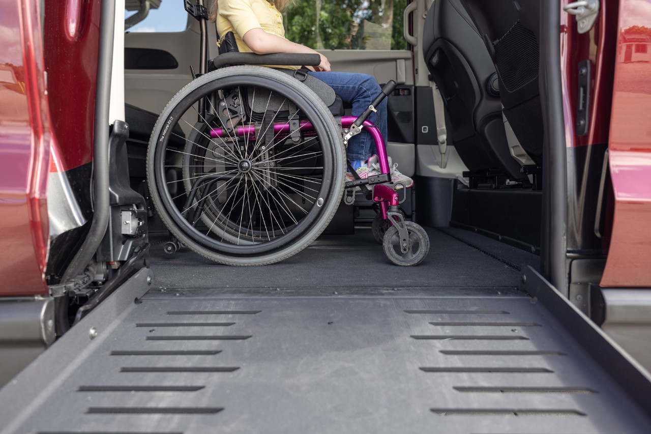 Chrysler Companionvan Wheelchair Van with Ramp Extended Side View of Wheelchair Wheel and Ramp