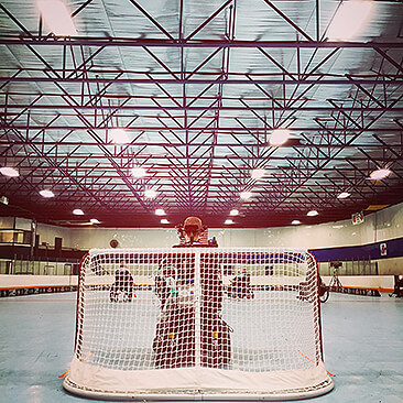 Goalie plays during a Michigan power hockey game|Michigan Mustangs prepare for national power hockey competition.