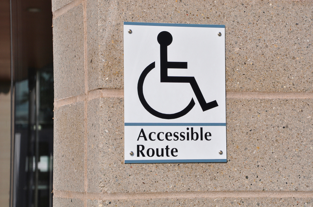 wheelchair accessible route sign at a college