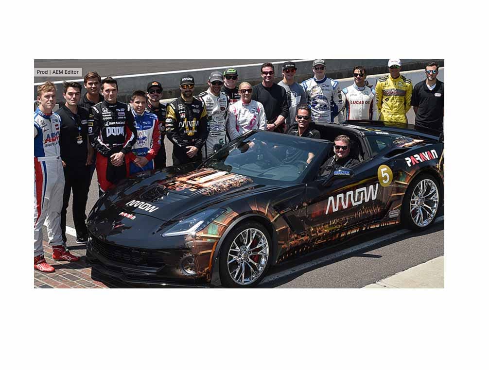 Sam Schmidt sitting in a racing uniform in his wheelchair