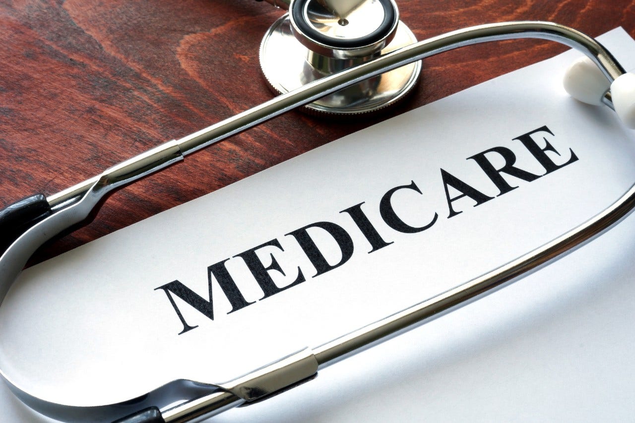 Word medicare written on a paper and stethoscope. Word medicare written on a paper and stethoscope.