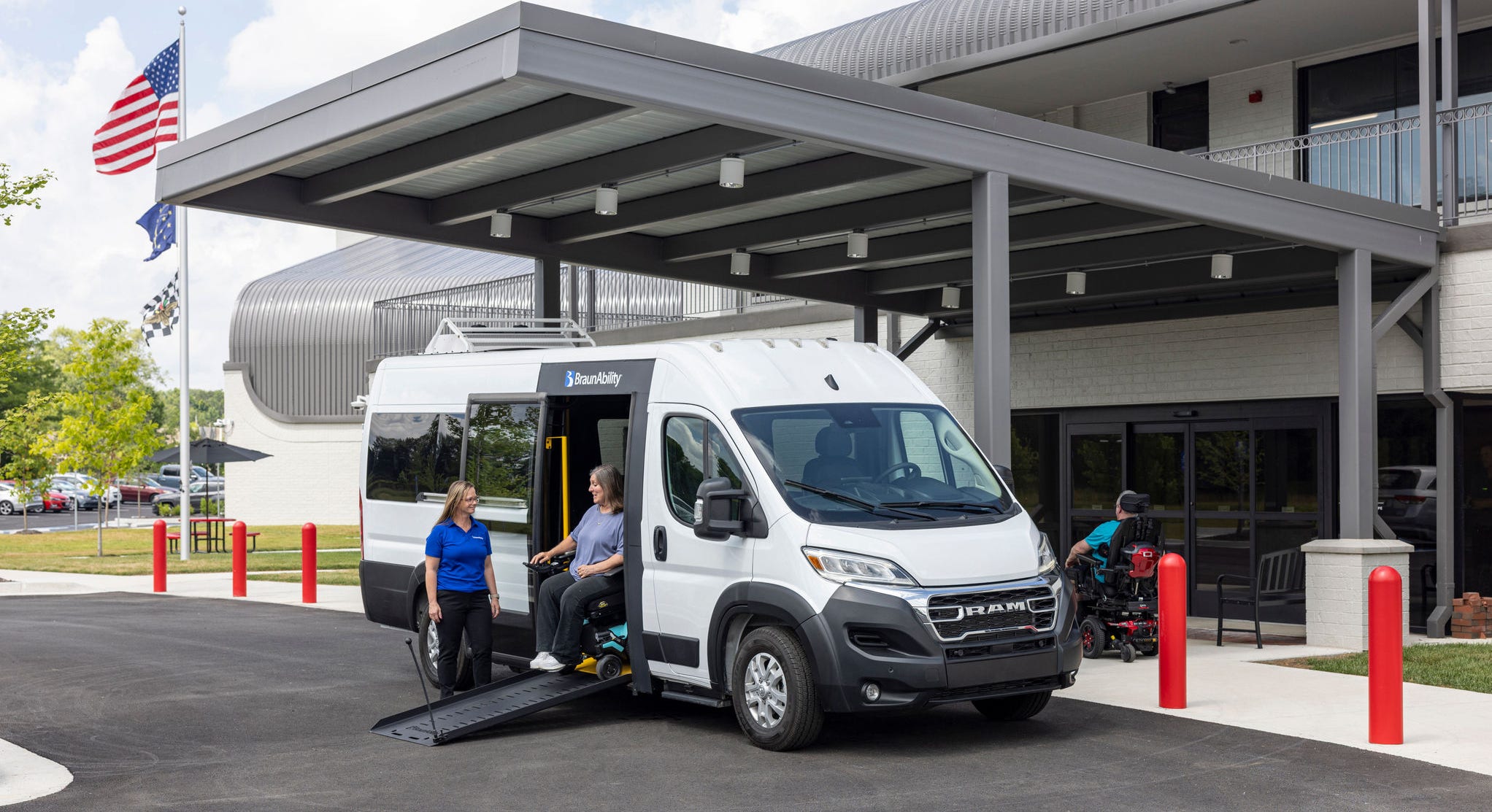 BraunAbility employee and wheelchair user with ProMaster Simple Stow van