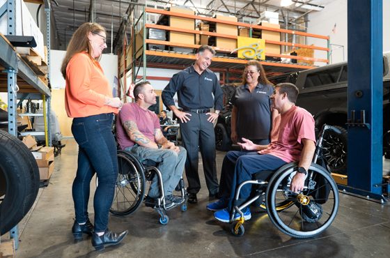 BraunAbility Employees and customers working together