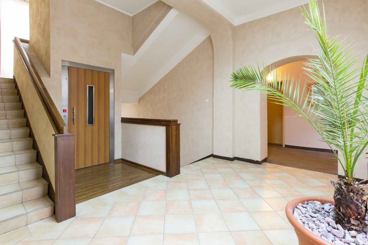 Hotel corridor with elevator and stairs