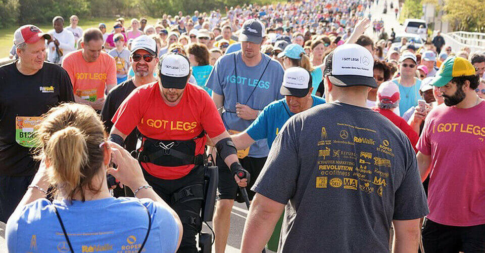 Adam Gorlitsky walking with a large group of people