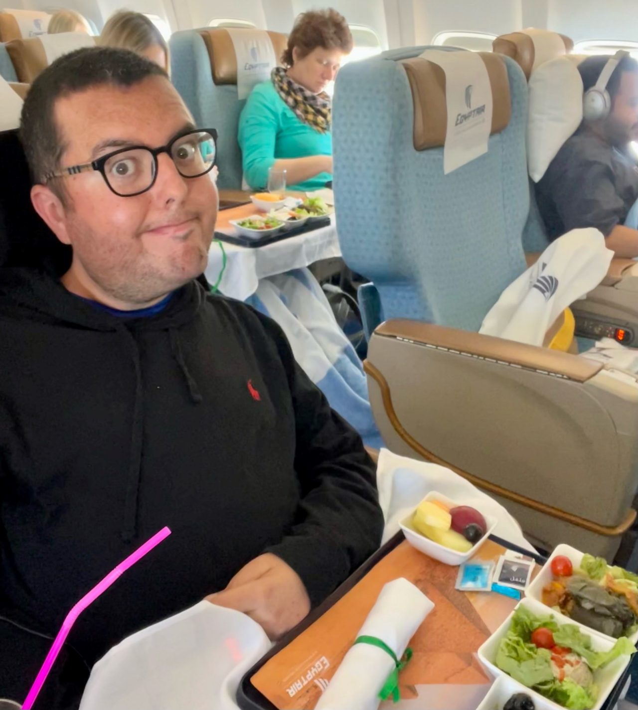 wheelchair user eating on airplane
