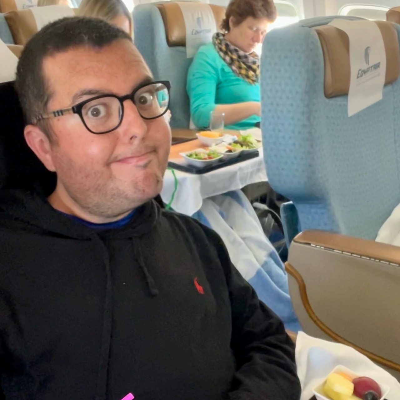 wheelchair user eating on airplane