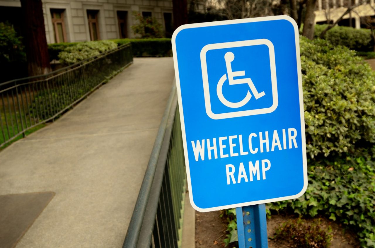 handicap wheelchair ramp sign handicap wheelchair ramp sign outside by the building