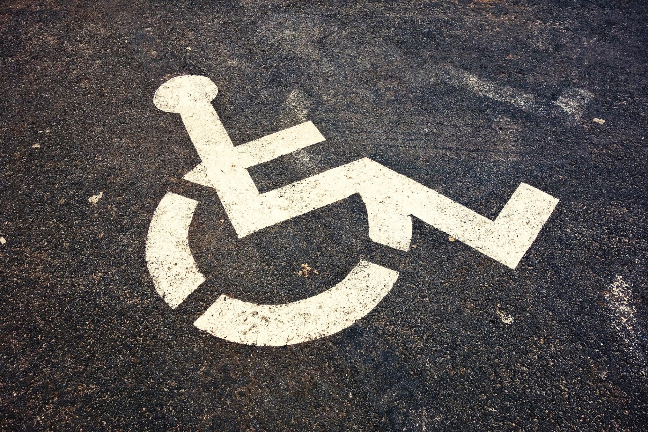 handicapped sign on pavement