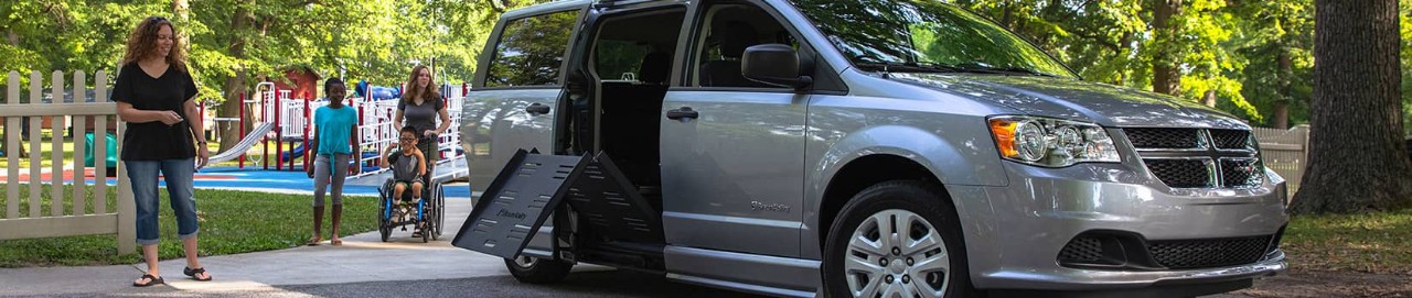 Side-entry foldout wheelchair car ramp