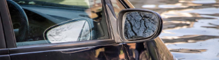 Man and woman sitting in a car.