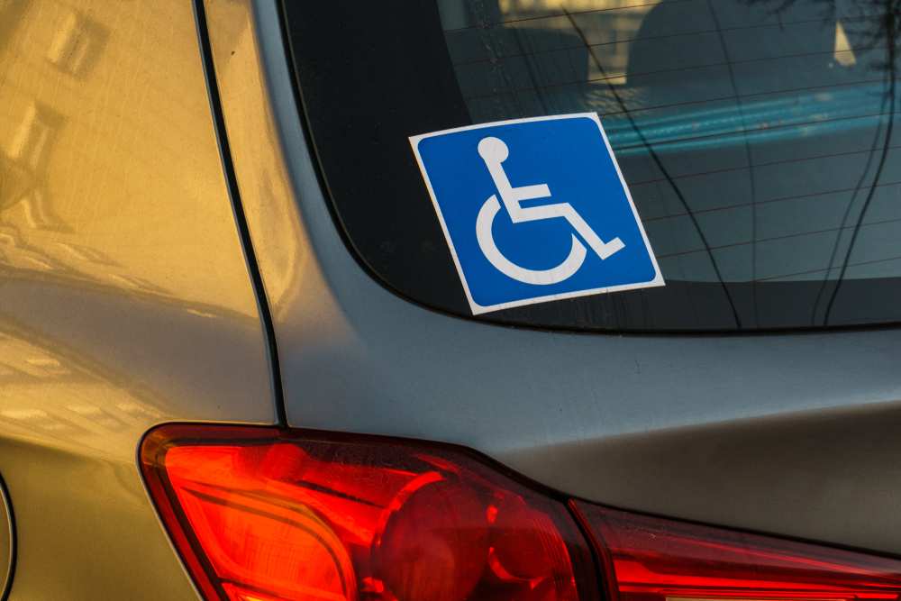 handicap sticker on the back of a car