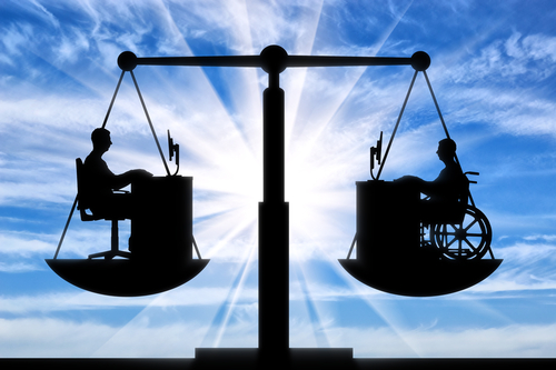 Silhouette of a man disabled in a wheelchair and a healthy man sitting at the table, they are equal on the scales of justice. The concept of equal employment opportunity persons with disabilities