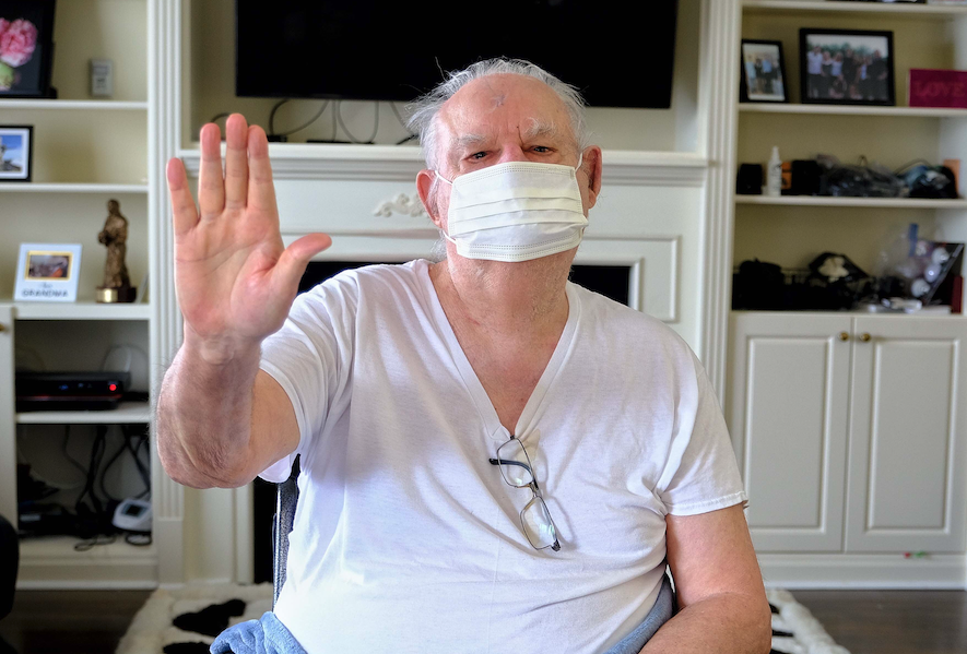 Man wearing PPE mask Man wearing PPE mask