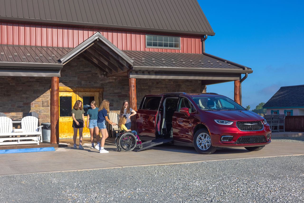 family using braunability chrysler wav side-entry ramp