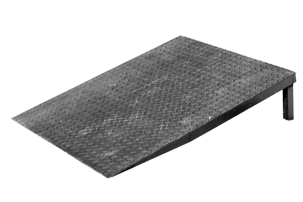 Metal portable wheelchair ramp isolated on white background Metal portable wheelchair ramp isolated on white background